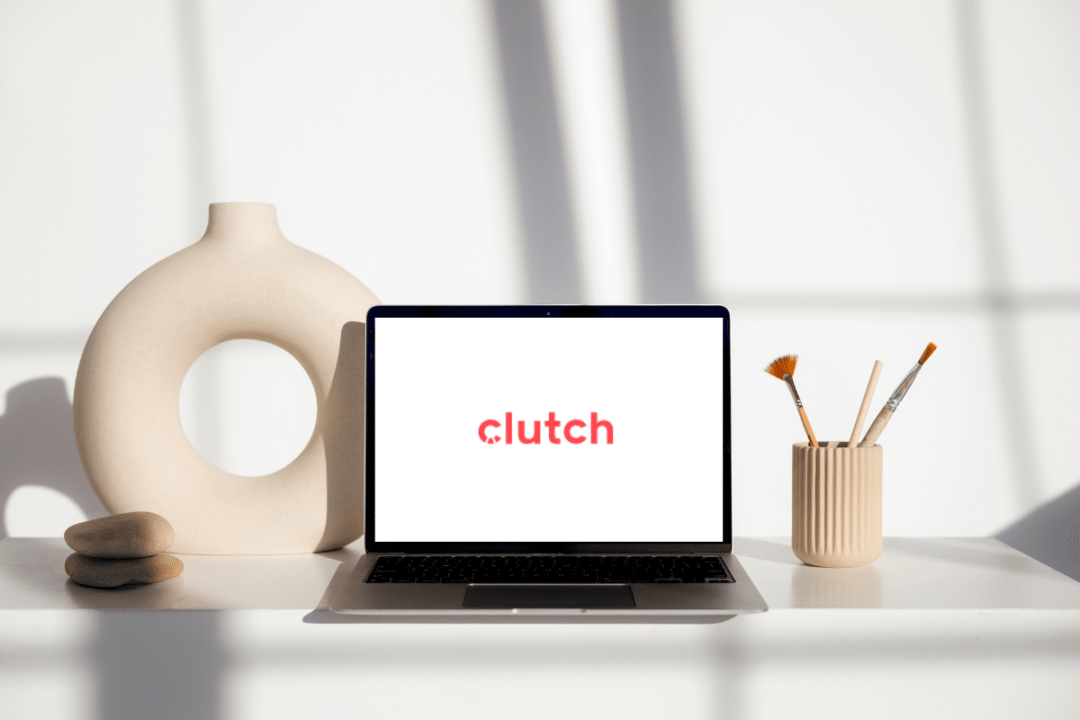 clutch company logo on a laptop screen on a desk
