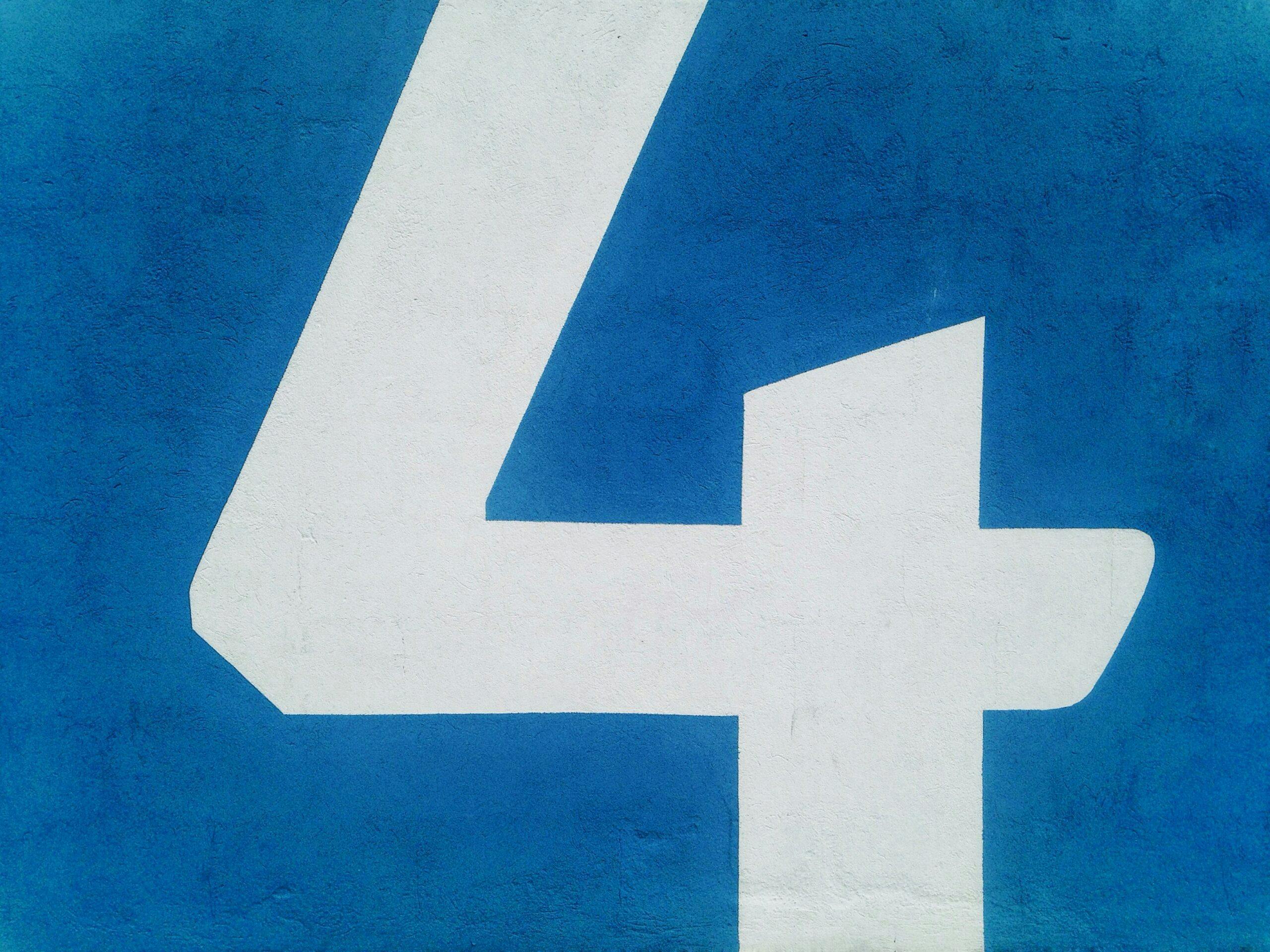 a blue and white number four